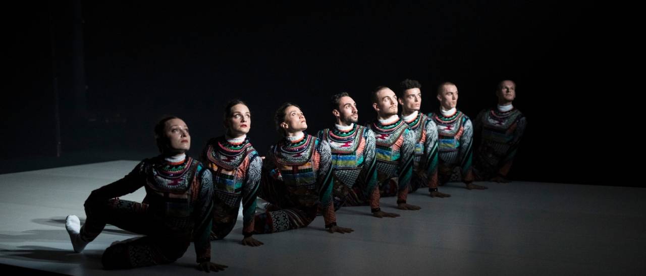 Tundra image dancers on the floor in an image looking up