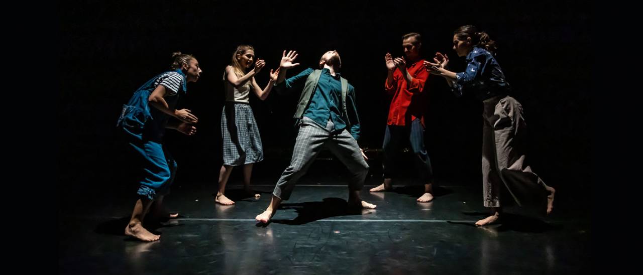 group in a circle while someone dances in the middle everyone clapping