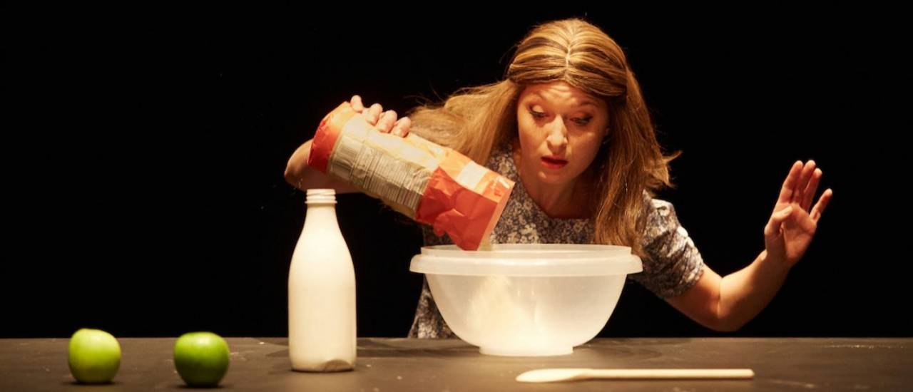 Cami pouring flour in to a mixing bowl