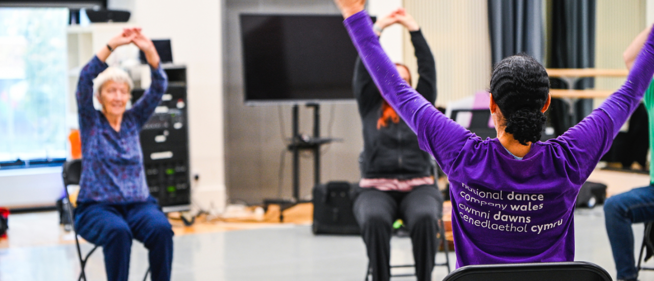 Dance for parkinson's, participants striding across the studio