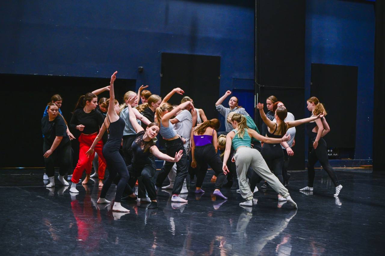 huge group of young dancers grooving together