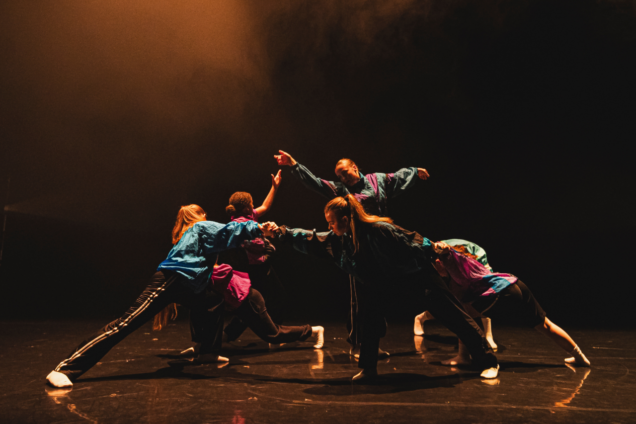 huge group of young dancers grooving together